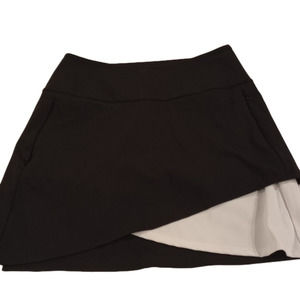 NWOT Kinona womens golf or tennis skort skirt, size extra small, black and white